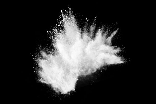 white particles on black background, representing zinc oxide